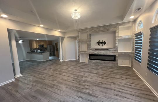 4841 Bridgefield Living Room Kitchen and pillars Wide View