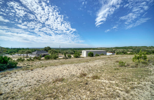 344 Beulah Ln Dripping Springs-large-026-003-View of House and Barn From-1490&#215;1000-72dpi
