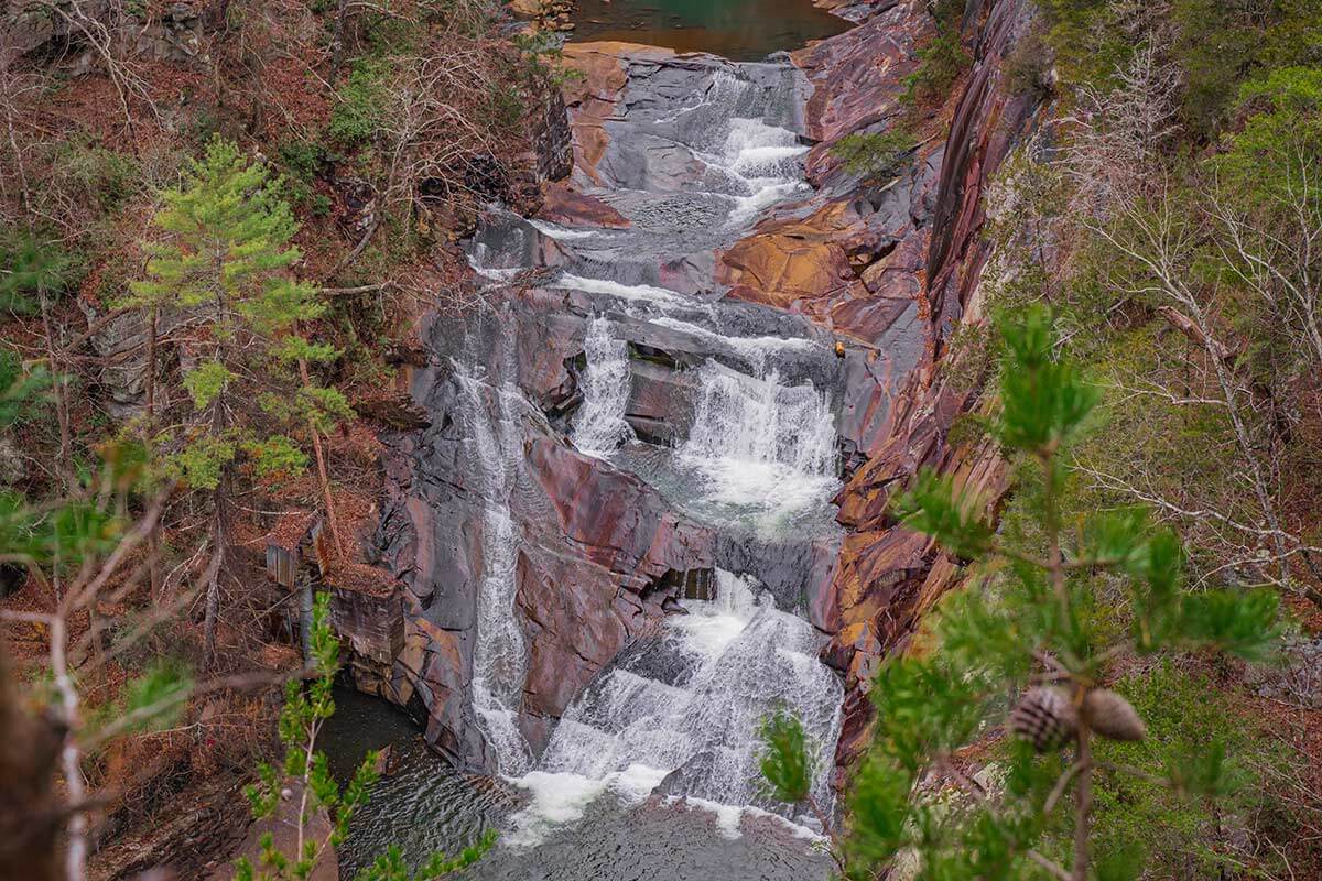 Stunning waterfall surrounded by vibrant fall foliage in the northeast Georgia mountains