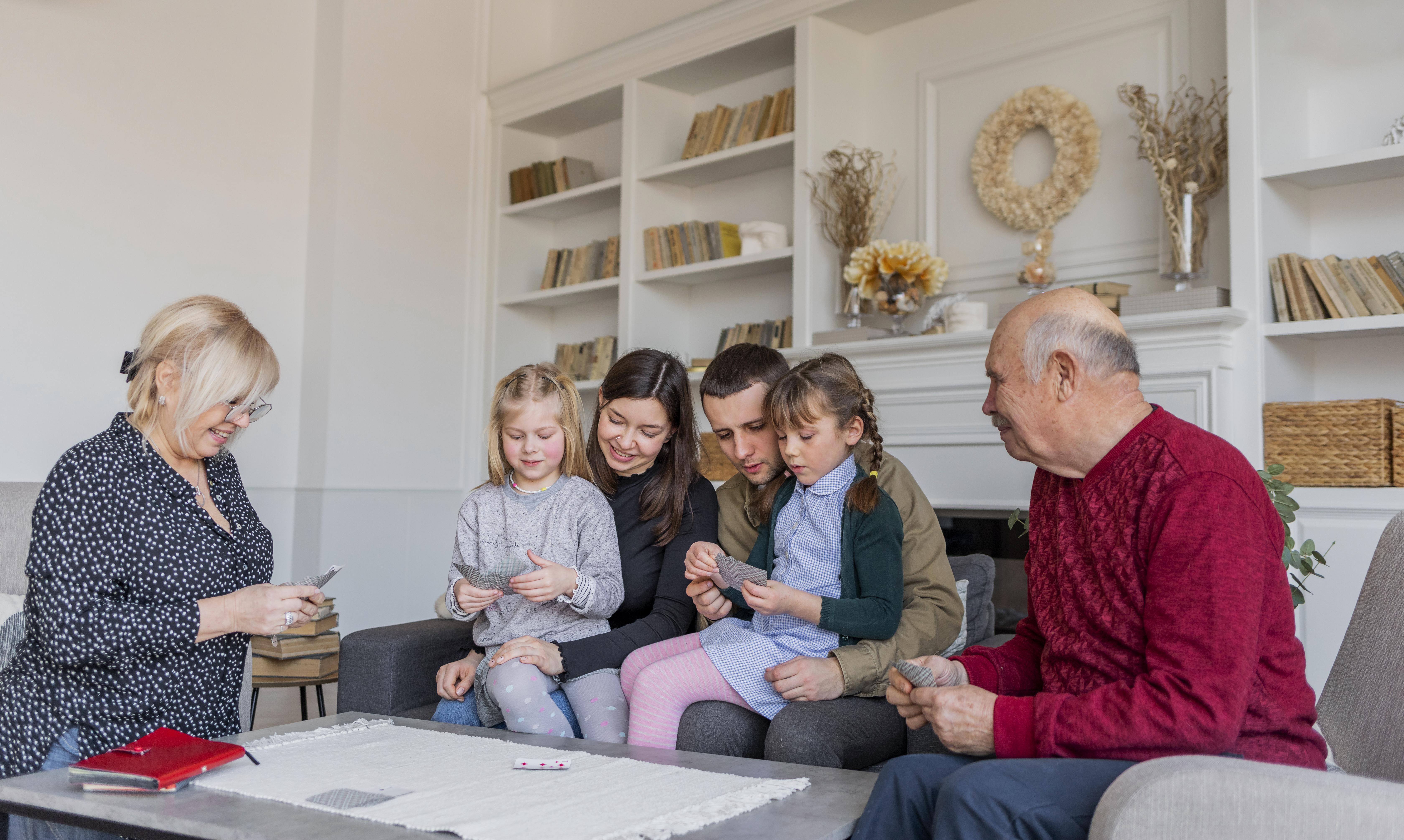 medium-shot-family-members-playing-games