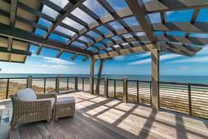 Beach house balcony overlooking the beach