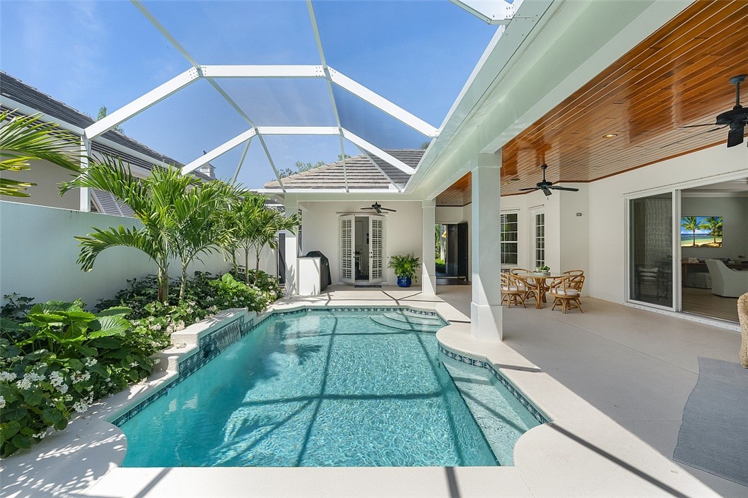 Lakefront home and tropical outdoor setting within Seasons