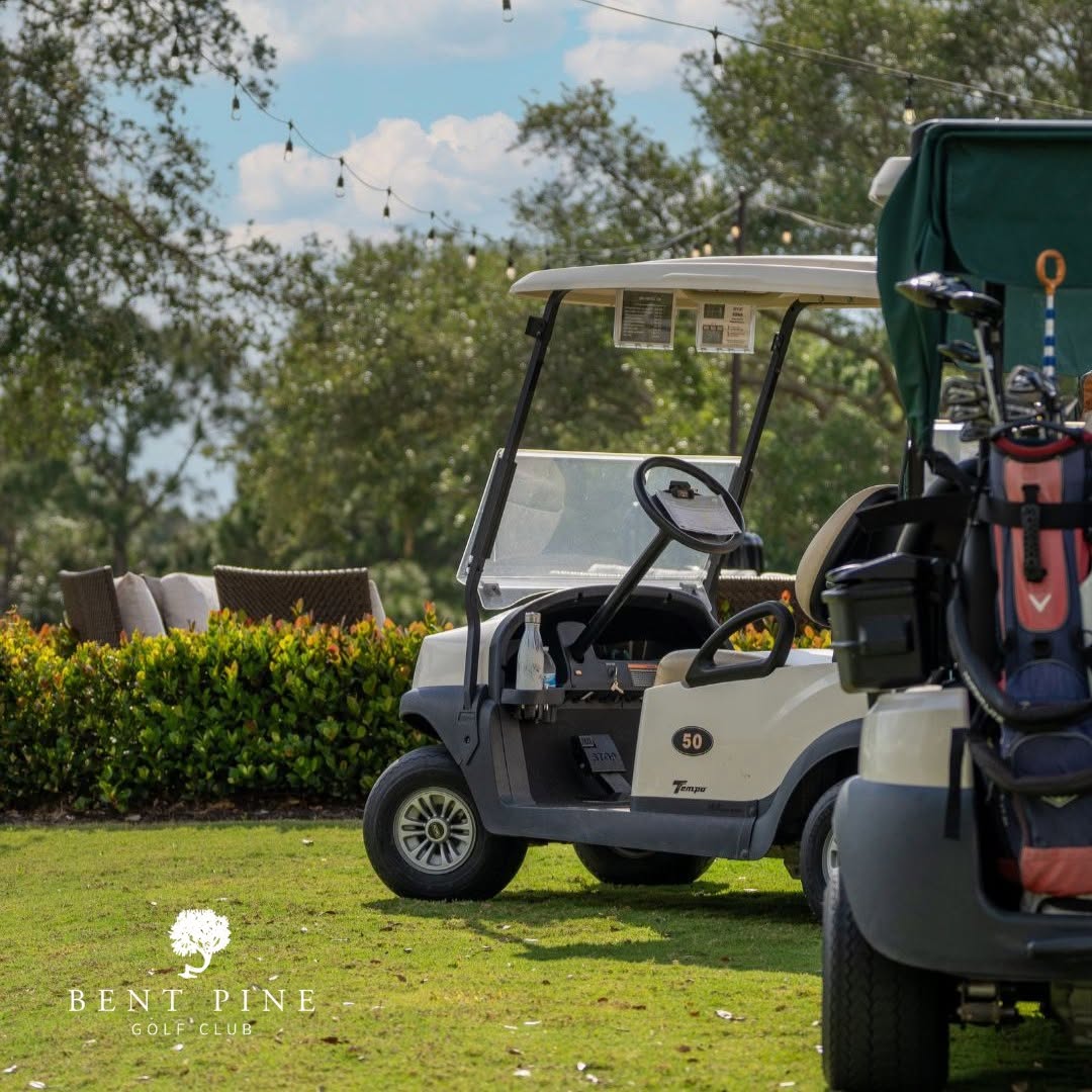 Golf cart and clubs prepared for a round at Bent Pine Golf Club