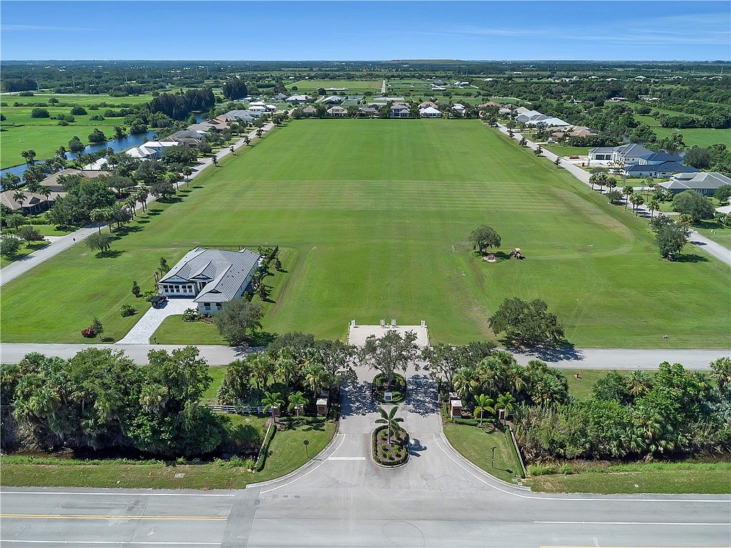 Estate home and landscaped setting within Vero Beach Polo Grounds