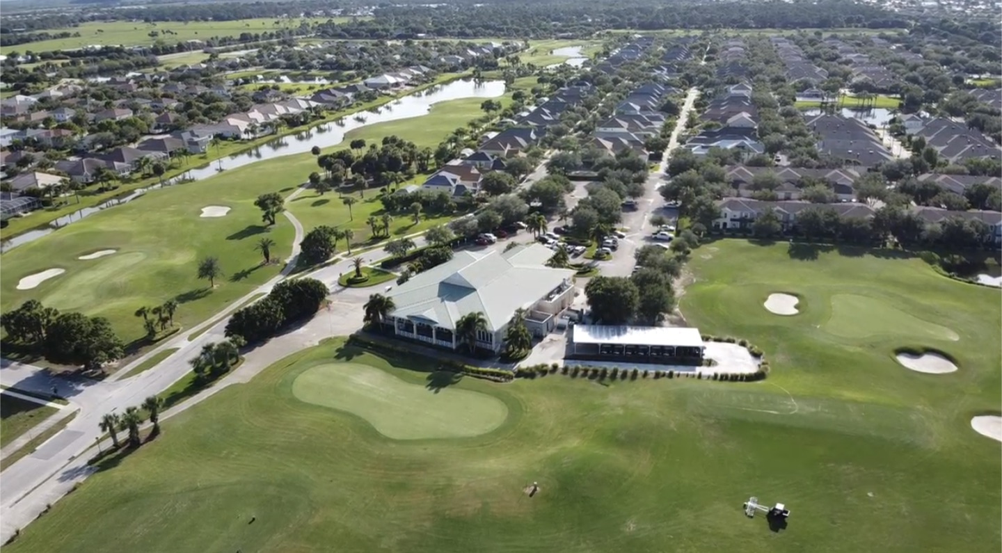 Scenic fairway, lake, and homes at Pointe West in Vero Beach