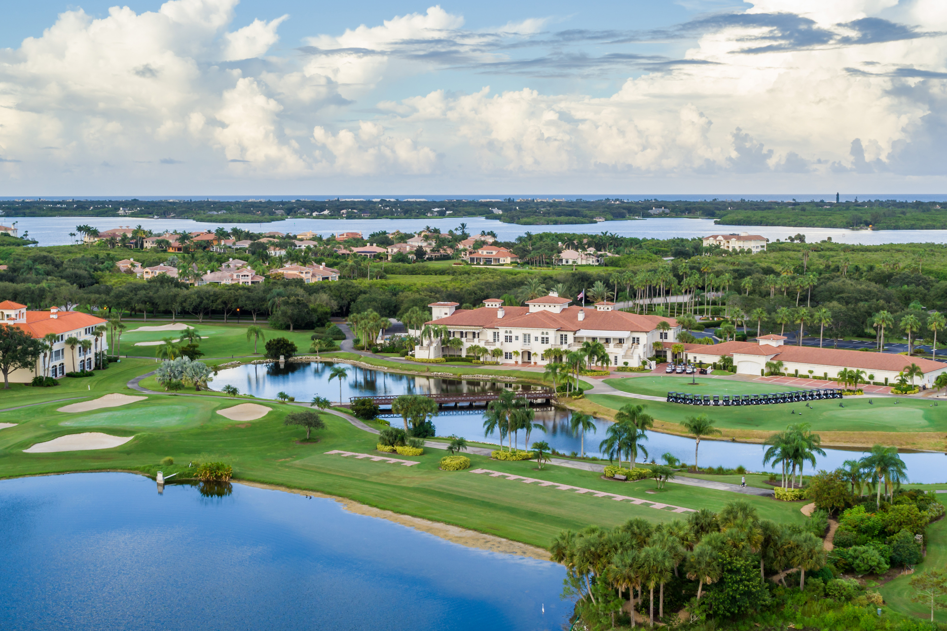 Aerial view of Grand Harbor residences, golf courses, and waterways
