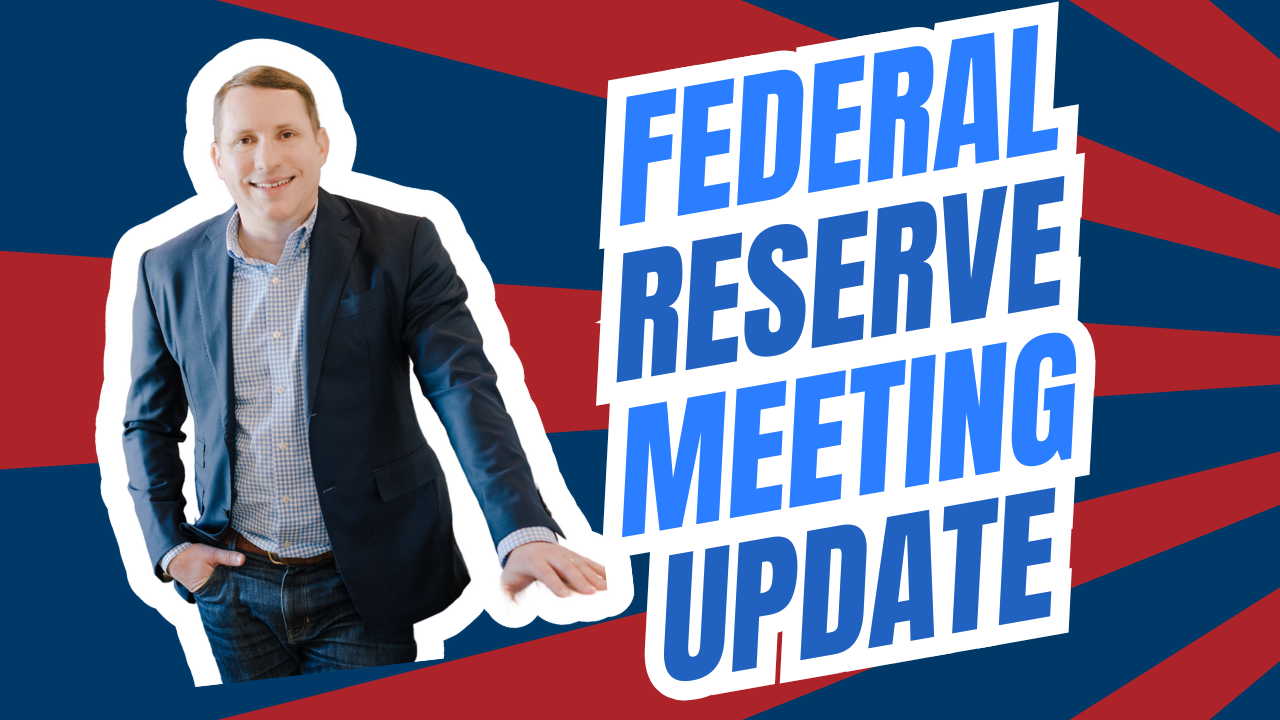 Brandon Yopp, a professional real estate agent in North Carolina’s Triangle region, stands confidently in front of a bold red and blue background next to large text reading “Federal Reserve Meeting Update,” representing mortgage rate news and housing market updates for May 2025.
