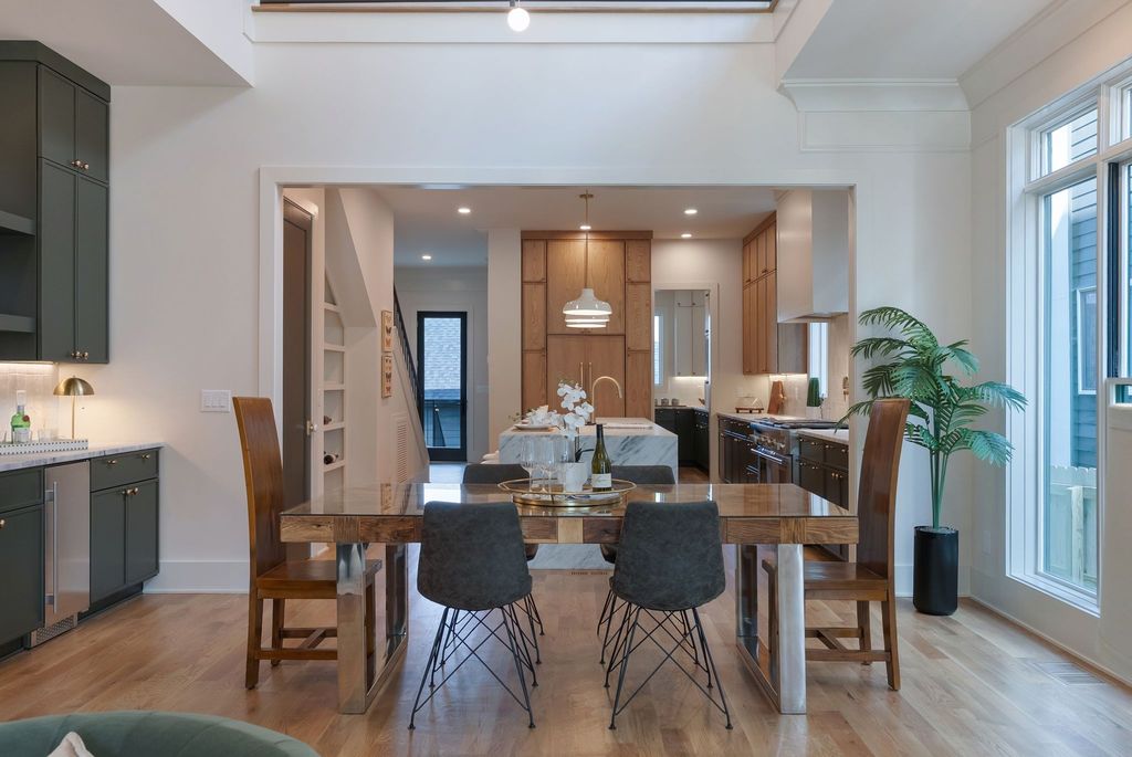 Chef's kitchen with marble island and custom cabinetry at 1616 7th Avenue North, Nashville TN