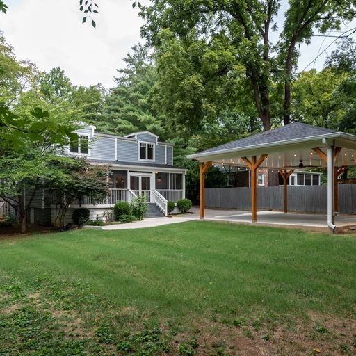 Spacious backyard with covered pavilion at a Green Hills Nashville home in 37215