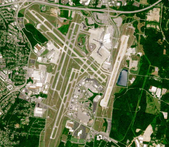 Aerial satellite view of Nashville International Airport (BNA) runways and terminals