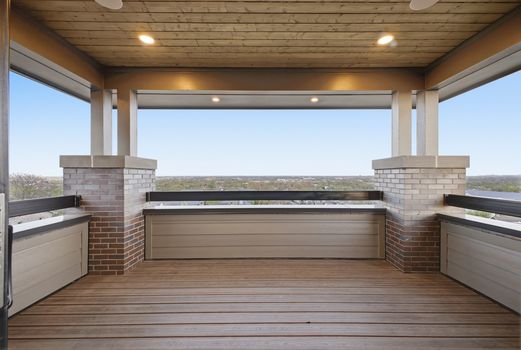 Third-floor covered balcony with panoramic views of Nashville and Green Hills from new construction home at 2113 Eastwood Ave in 12 South