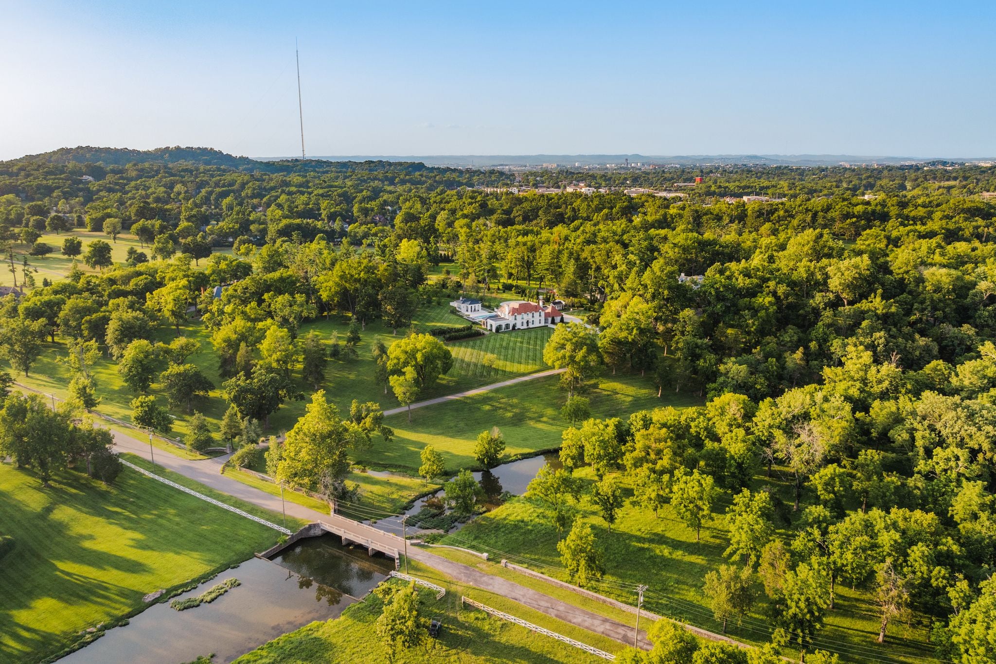 Aerial of the historic stone bridge crossing Richland Creek at 4753 Post Road, Hillwood, Nashville