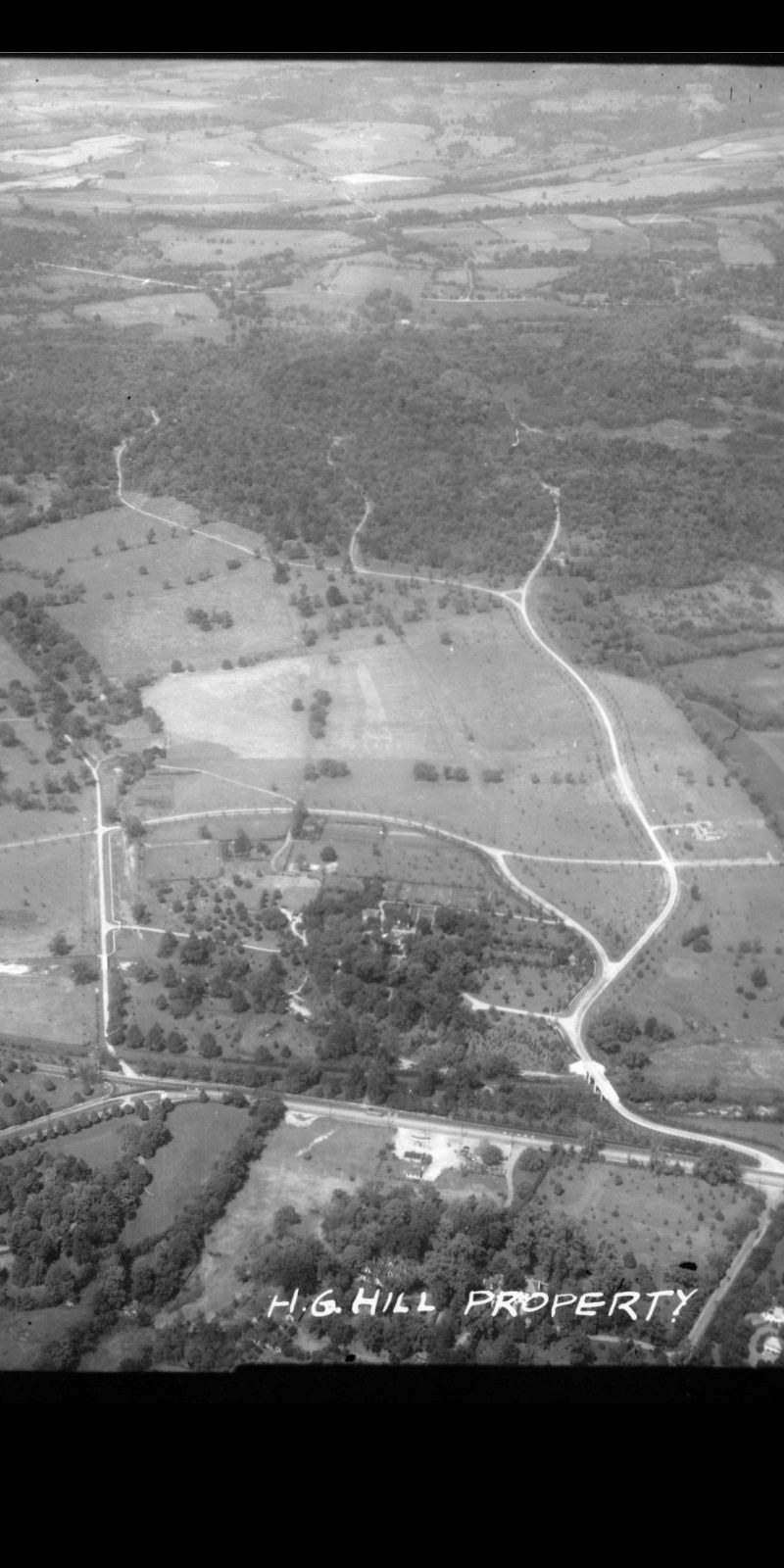 Aerial survey of the H.G. Hill property, showing the full estate and Richland Creek grounds, late 1930s