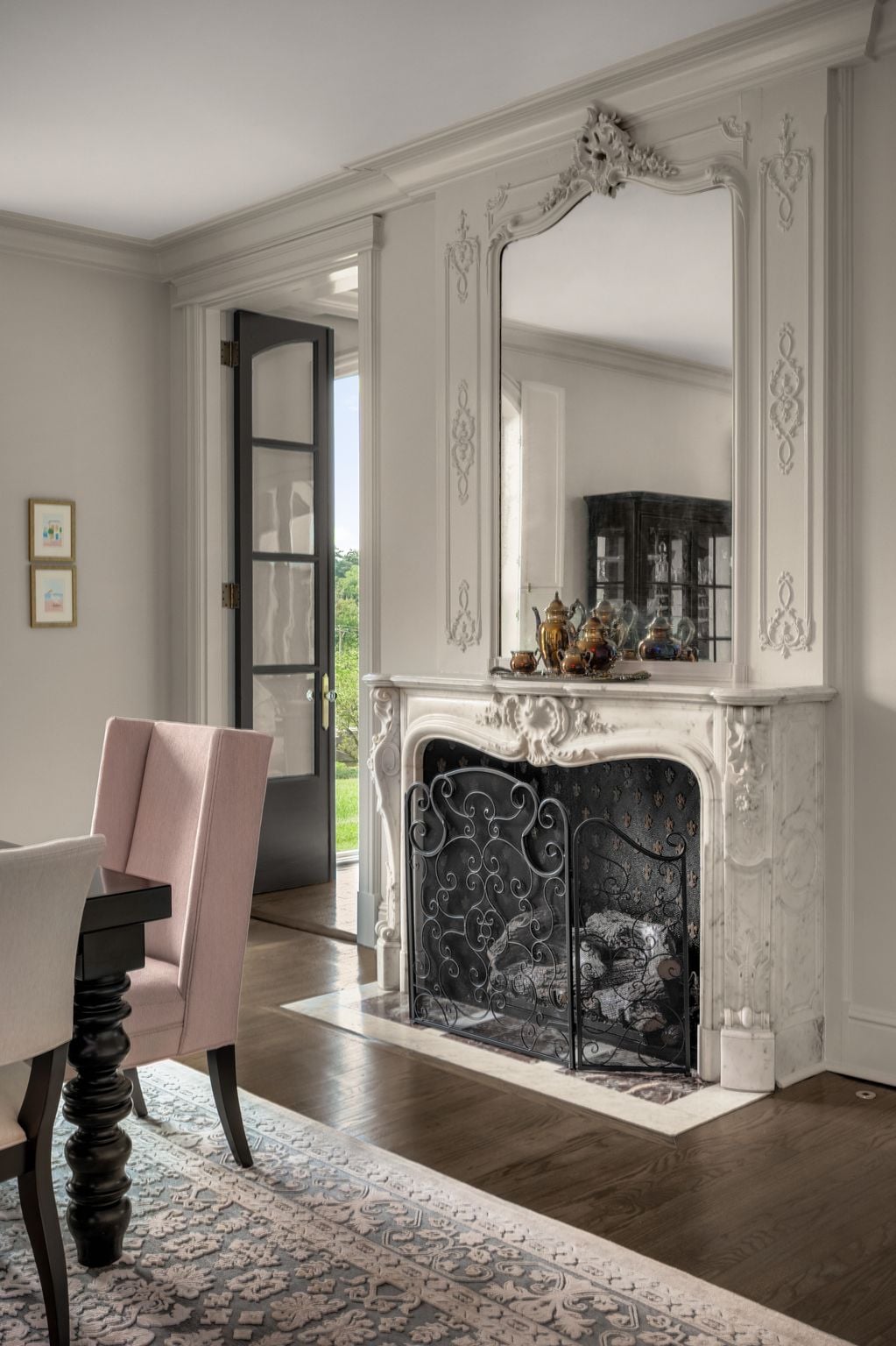 Ornate French rococo carved marble fireplace in the dining room at 4753 Post Road, Hillwood Nashville