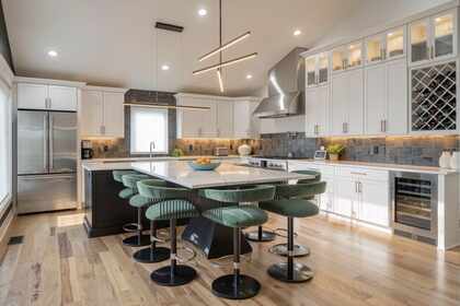 1806 5th Avenue North kitchen with oversized island and 60-inch gas range