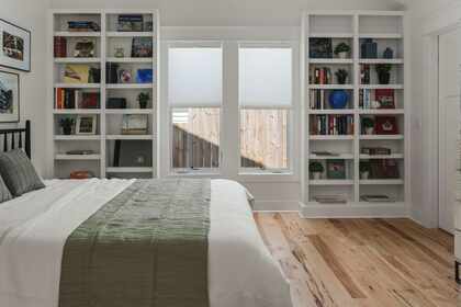 1806 5th Avenue North main-floor bedroom with built-in shelving