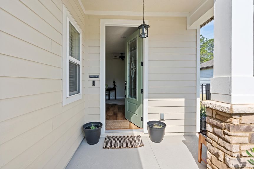 Front door entrance with stylish design and a welcoming atmosphere.