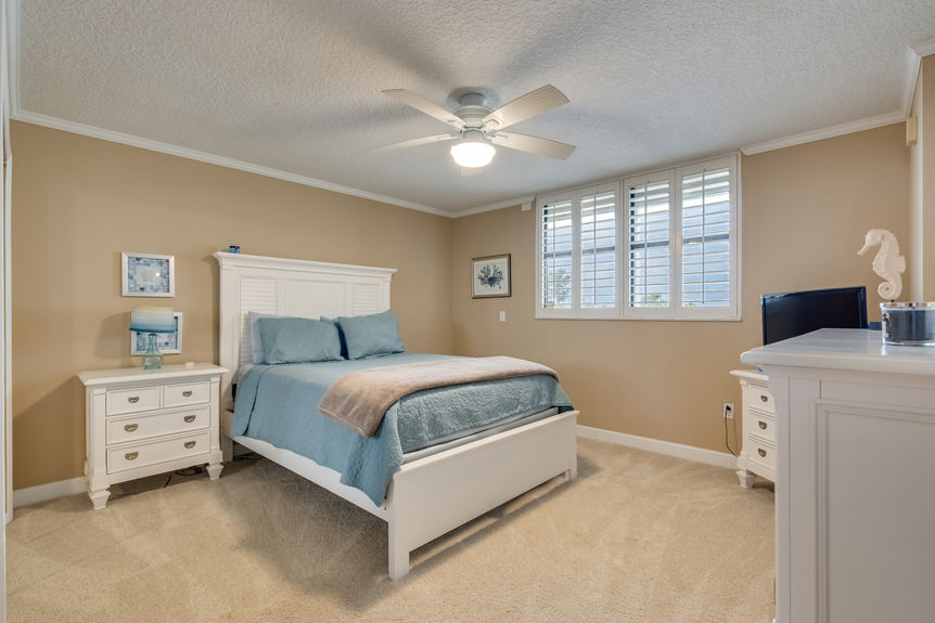 Guest Bedrooms – Comfortable and beautifully furnished guest bedrooms in a beachfront condo at Sand Dollar Community.