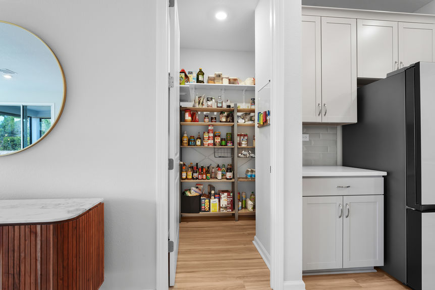 Gourmet chef’s kitchen featuring a large island, stainless steel appliances, and custom cabinetry at 50 Skyline Lane.