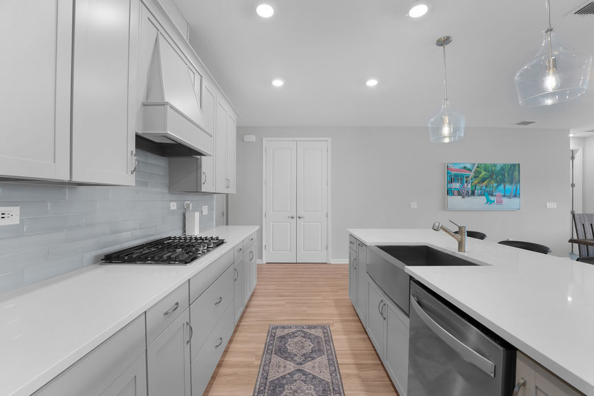 Gourmet chef’s kitchen featuring a large island, stainless steel appliances, and custom cabinetry at 50 Skyline Lane.