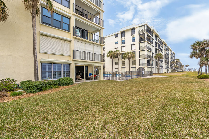 Covered Patio View – Private covered patio with direct views of the Atlantic Ocean and white sandy beaches.