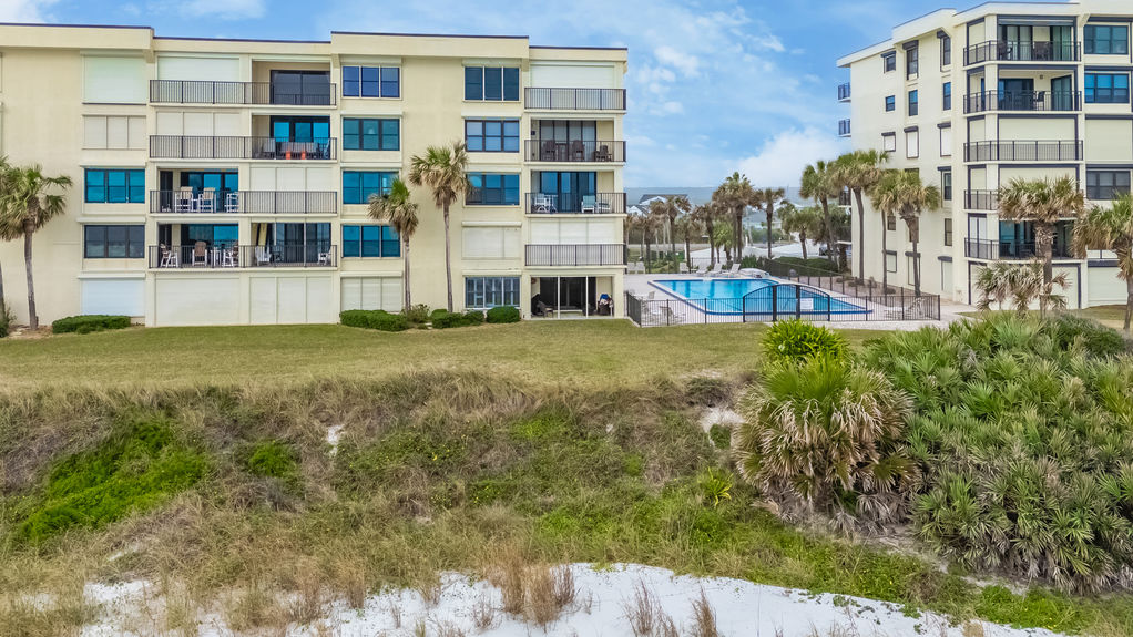 Aerial View – Aerial shot showcasing the Sand Dollar Community and its prime oceanfront location.