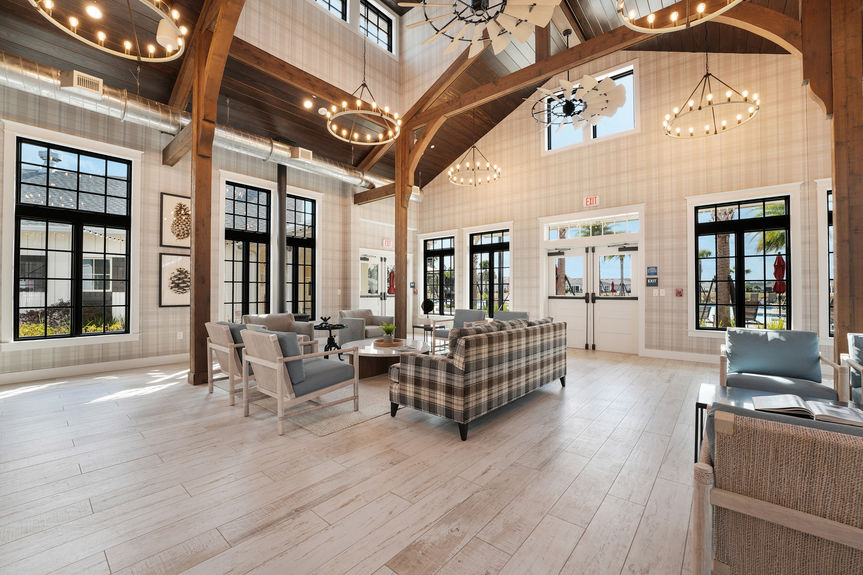 Luxurious 55+ community amenities, including a pool, clubhouse, and walking trails at Reverie at Trailmark in St. Augustine.