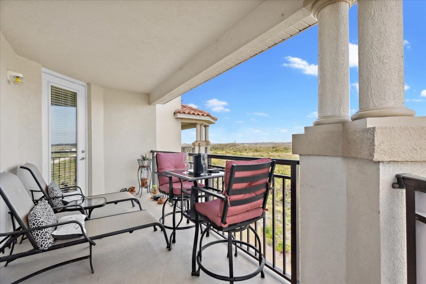 Expansive marsh and Intracoastal waterway views from the private balcony of a St. Augustine condo.