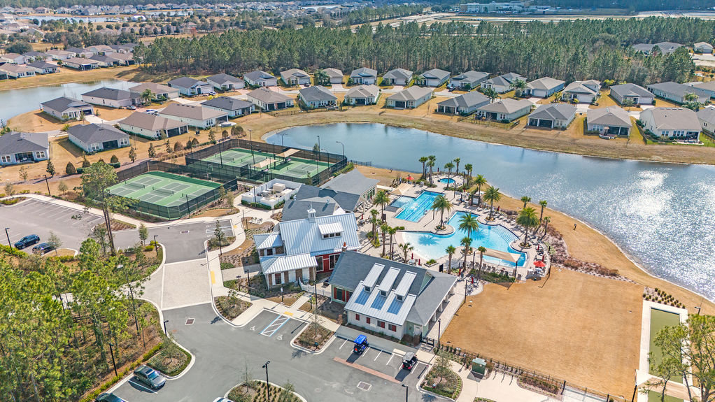 Luxurious 55+ community amenities, including a pool, clubhouse, and walking trails at Reverie at Trailmark in St. Augustine.