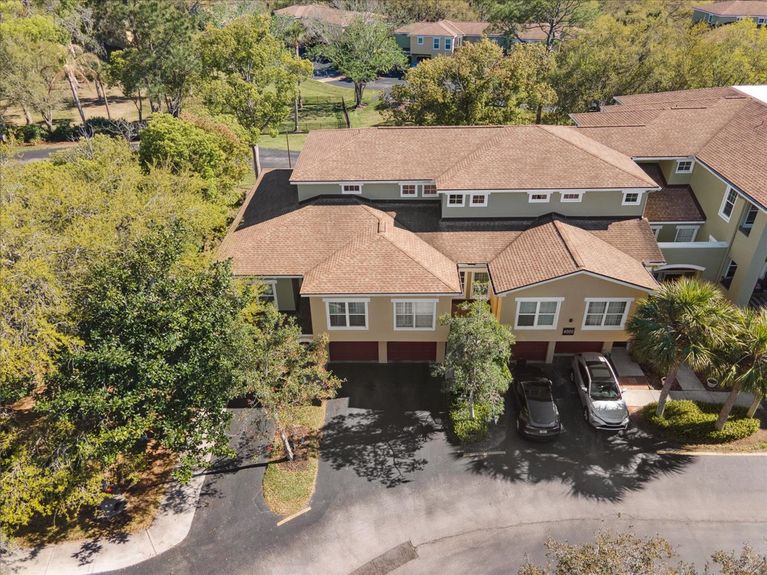 Aerial view of 4000 Grande Vista Blvd Unit 15-104 in the Las Palmas community, showcasing the condo building