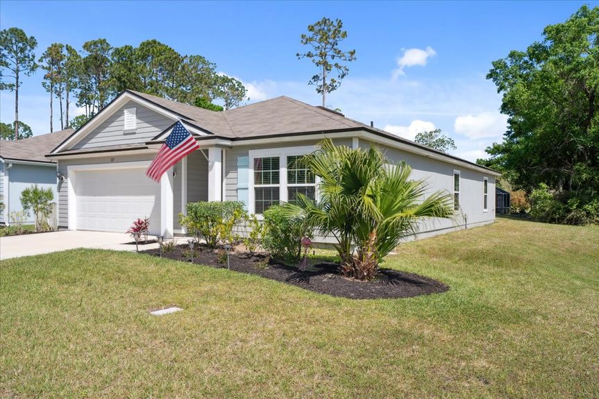 Single-story move-in ready home with 3 bedrooms, 2 baths, screened lanai, and pond views near community pool, pickleball courts, and fitness center.