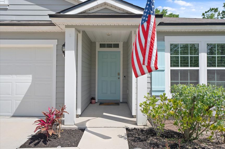 Single-story move-in ready home with 3 bedrooms, 2 baths, screened lanai, and pond views near community pool, pickleball courts, and fitness center.