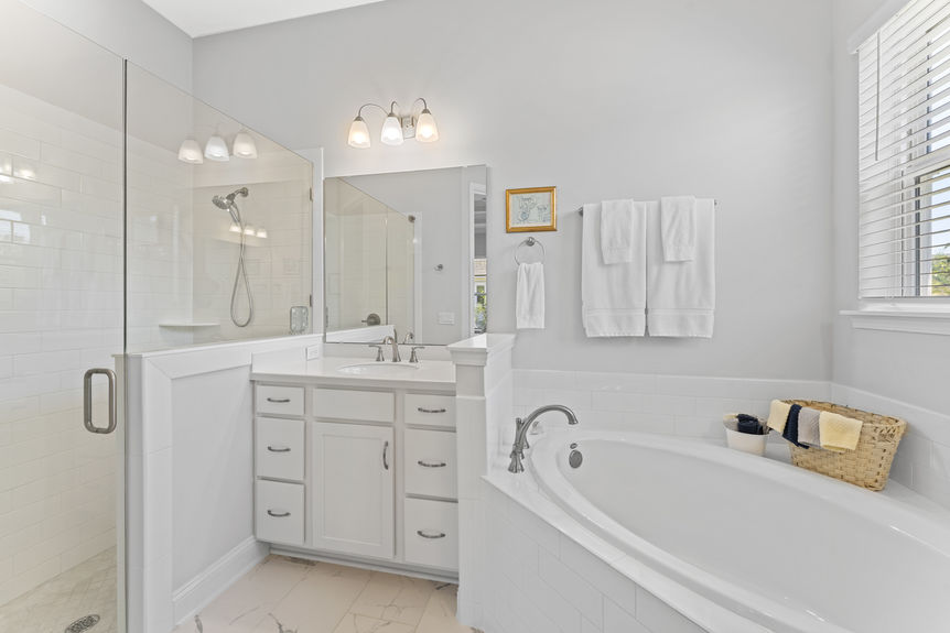 Primary bathroom featuring soaking tub