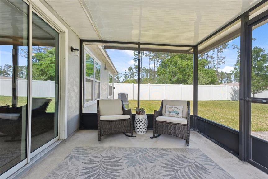 Single-story move-in ready home with 3 bedrooms, 2 baths, screened lanai, and pond views near community pool, pickleball courts, and fitness center.