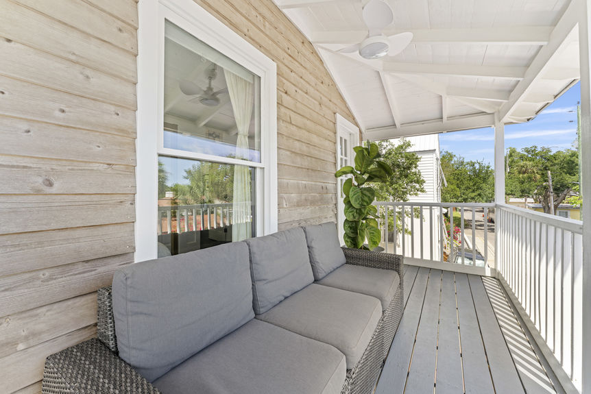 Covered porch with seating overlooking historic Lincolnville neighborhood in St. Augustine