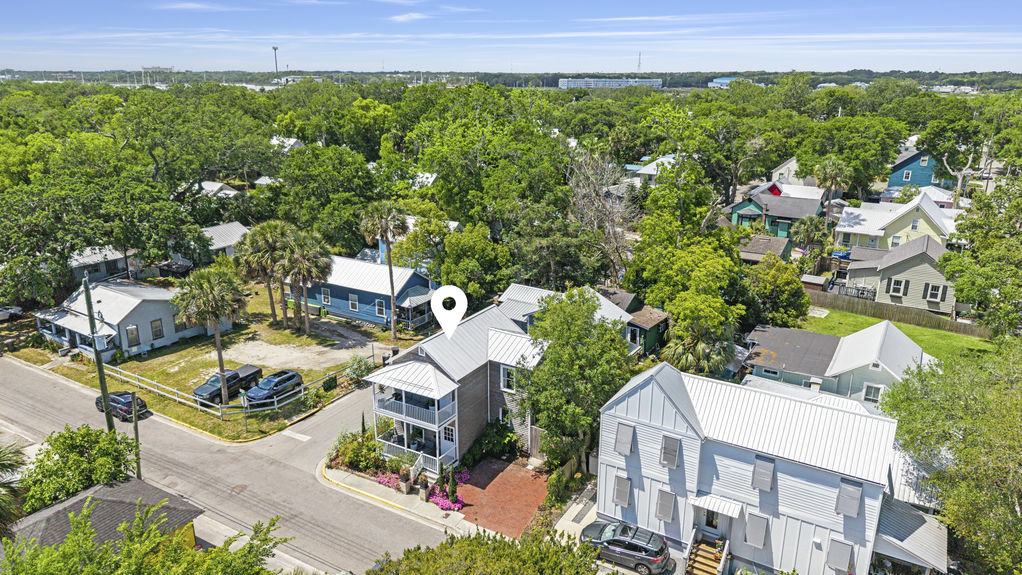 Aerial view of a restored historic home with two-story porch in Lincolnville, a downtown St. Augustine neighborhood