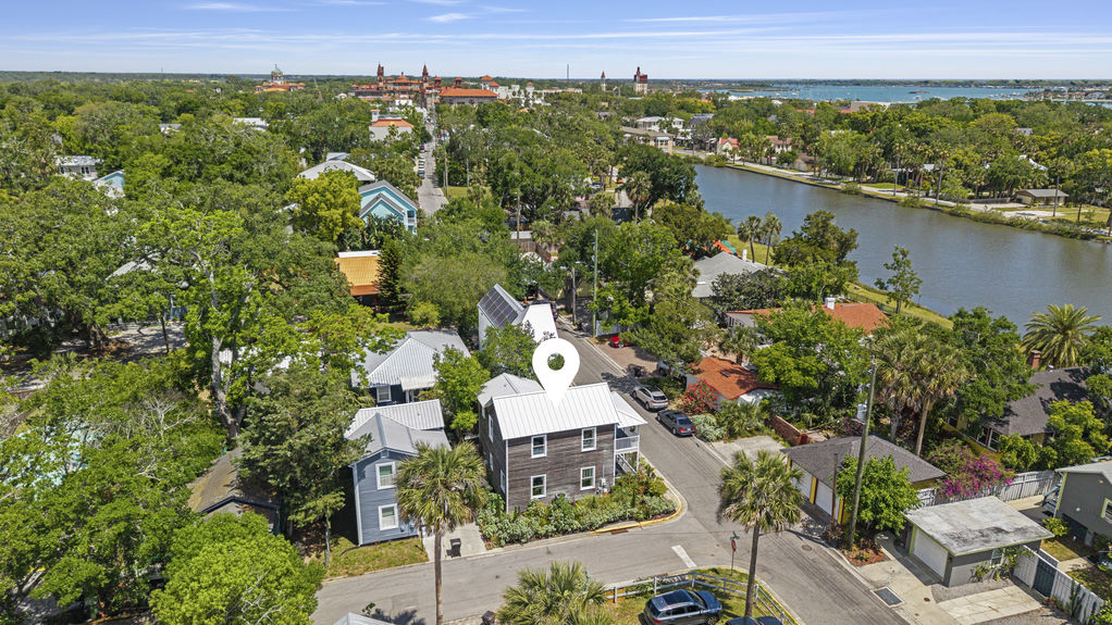 Aerial view of a restored historic home with two-story porch in Lincolnville, a downtown St. Augustine neighborhood