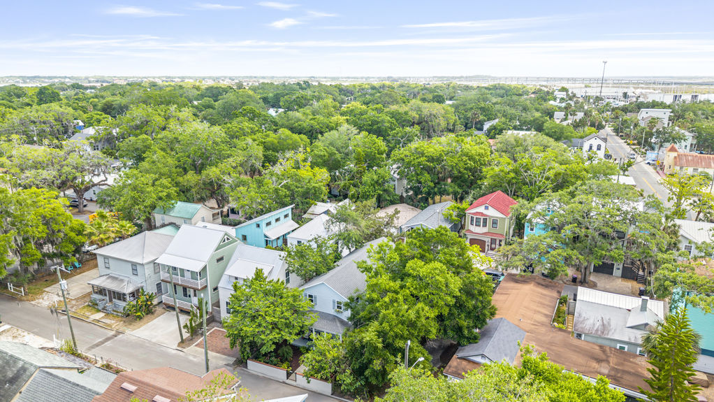 Aerial view of a stilted 3-bedroom cottage with dual street access in Lincolnville, St. Augustine