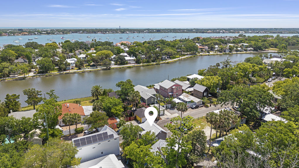 Aerial view of a restored historic home with two-story porch in Lincolnville, a downtown St. Augustine neighborhood