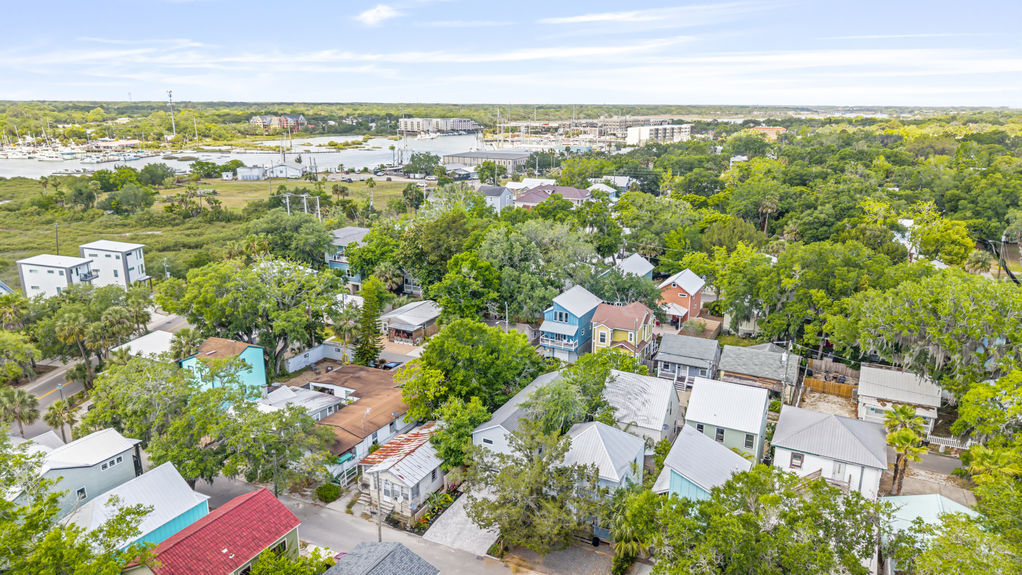 Aerial view of a stilted 3-bedroom cottage with dual street access in Lincolnville, St. Augustine