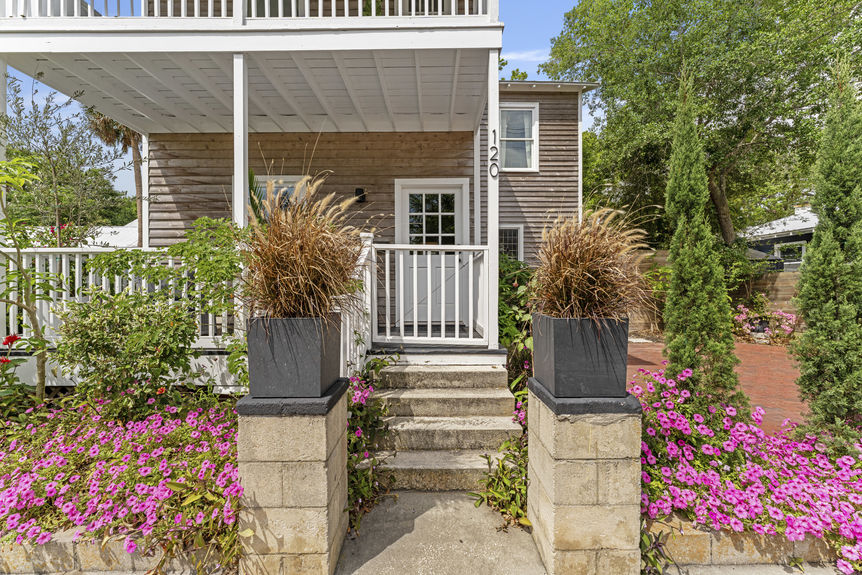 Covered porch with seating overlooking historic Lincolnville neighborhood in St. Augustine
