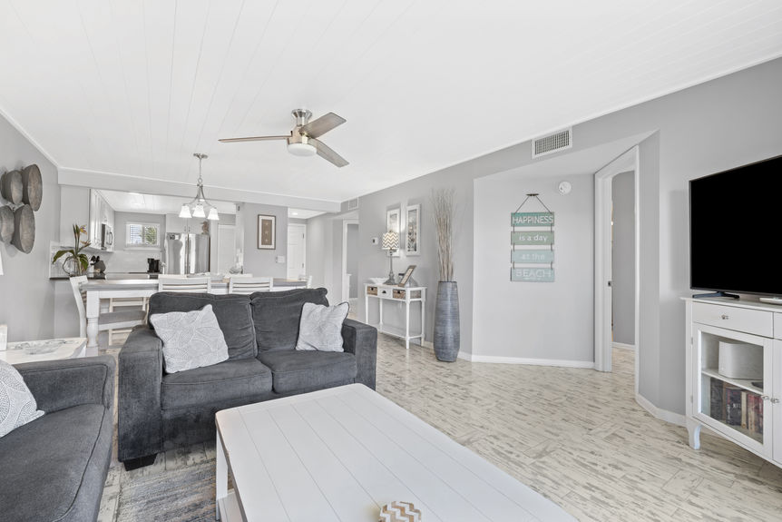 Open living and dining area with access to private balcony in St. Augustine Beach