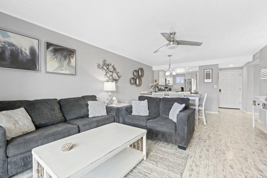 Open living and dining area with access to private balcony in St. Augustine Beach