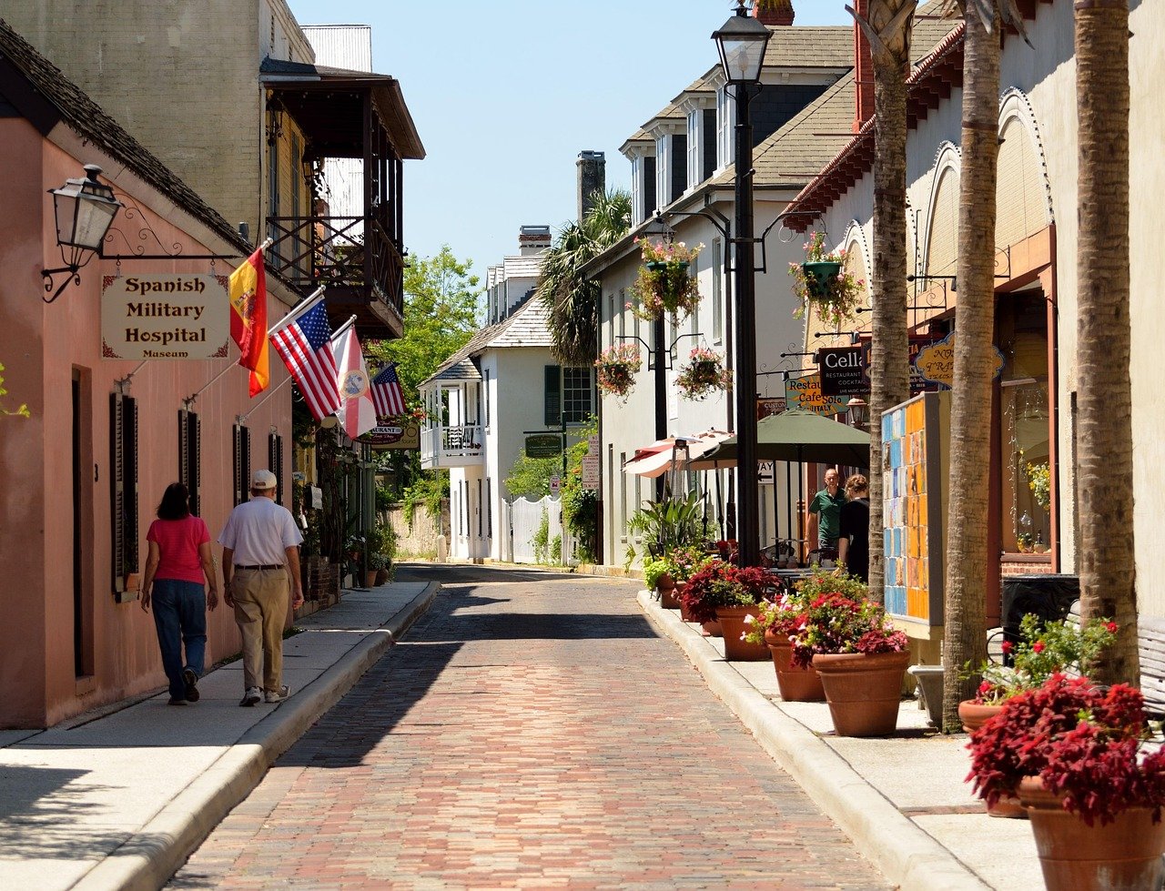 Cobblestone streets and colorful buildings in historic downtown St. Augustine.