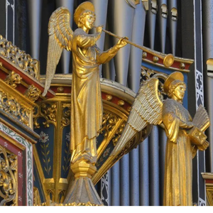 Golden angel statues on a pipe organ inside the Cathedral Basilica of St. Augustine, Florida