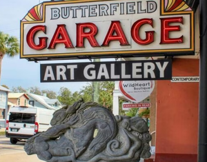 Butterfield Garage Art Gallery sign in St. Augustine, Florida, featuring local contemporary artwork and boutique shops