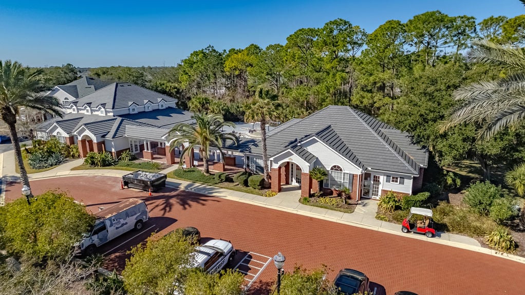 Drone photo of the main clubhouse building and brick-paved entrance at Harbour Vista Cir, St. Augustine, FL.