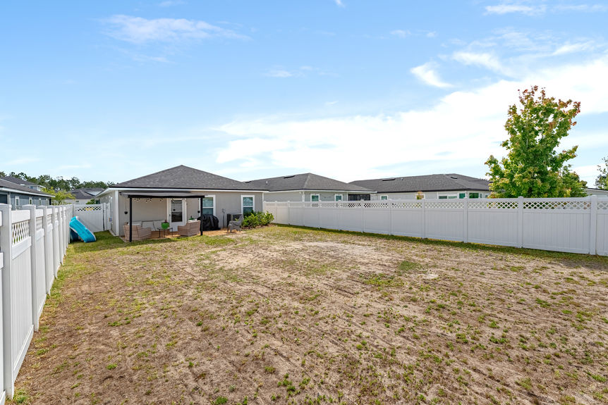 Fenced Backyard & Covered Patio | 52 Newland Court, St. Augustine, FL
