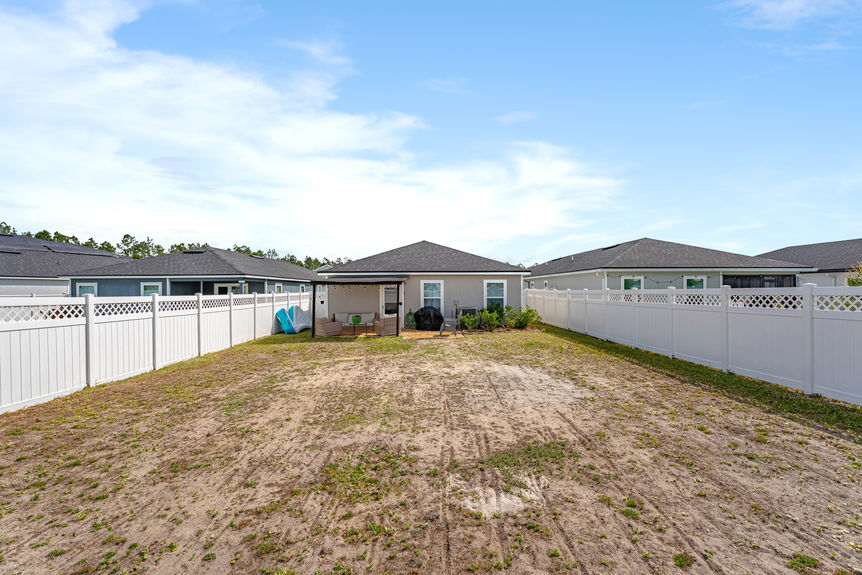 Fenced Backyard & Covered Patio | 52 Newland Court, St. Augustine, FL