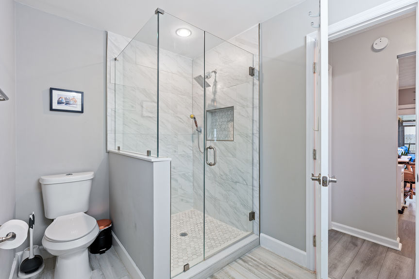 Remodeled Bathroom with Walk-In Glass Shower | FL Home
